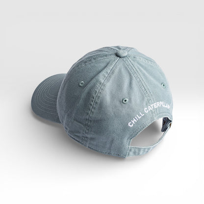 Chill Caterpillar graphic baseball cap in light blue, back view