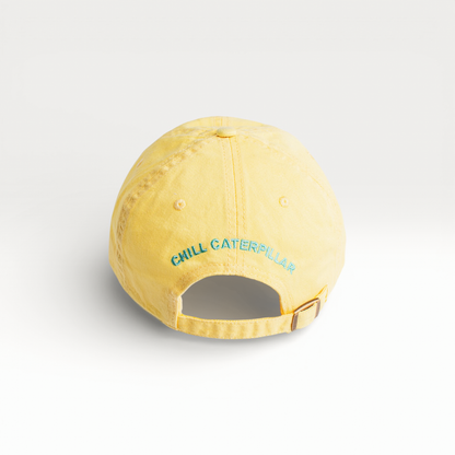 Chill Caterpillar graphic baseball cap in yellow, back view