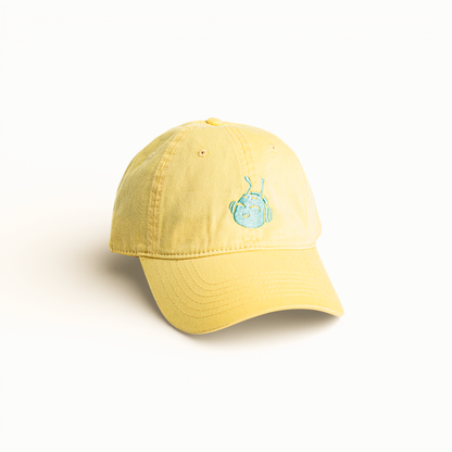 Chill Caterpillar graphic baseball cap in yellow, front view